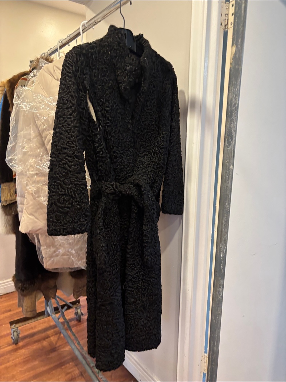 women’s small Persian lamb with belt needs repair on seams